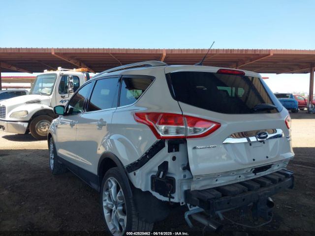 1FMCU0J99EUA63222 Ford 2014