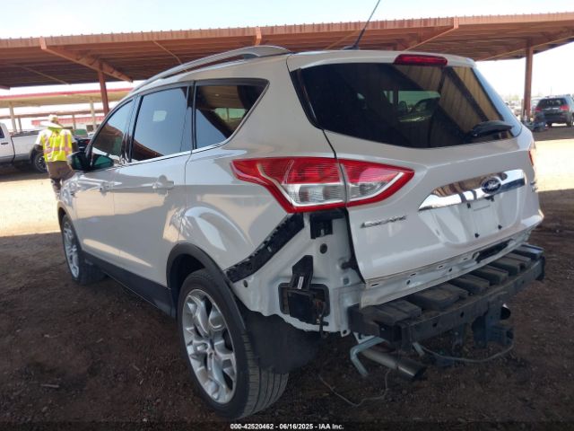 1FMCU0J99EUA63222 Ford 2014