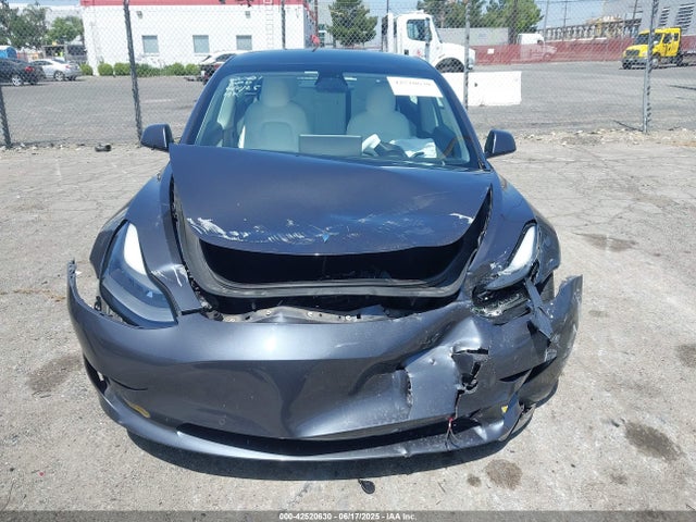 5YJ3E1EA8MF928717 Tesla 2021