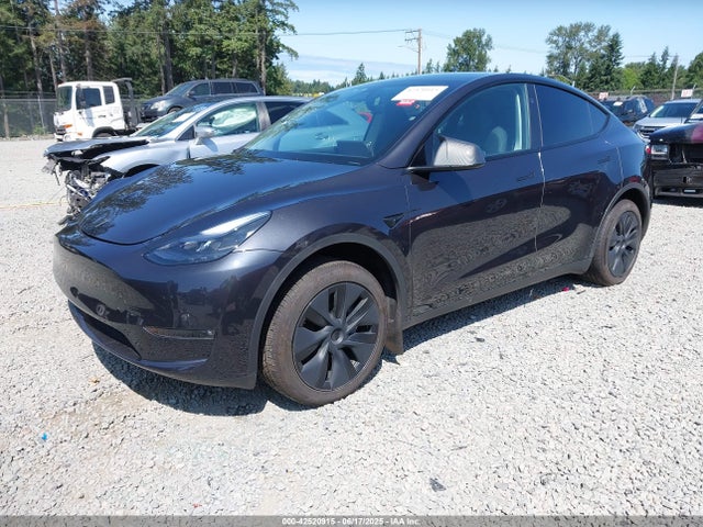 2024 TESLA MODEL Y 7SAYGAEEXRF180212 Photo 1
