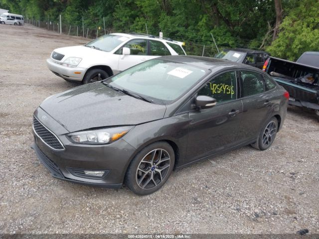 2018 FORD FOCUS 1FADP3H20JL200919 Photo 1