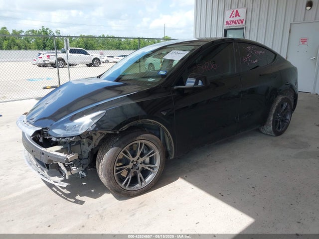 2024 TESLA MODEL Y 7SAYGAEE1RF151875 Photo 1
