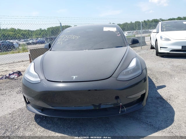 5YJ3E1EB3NF106675 Tesla 2022