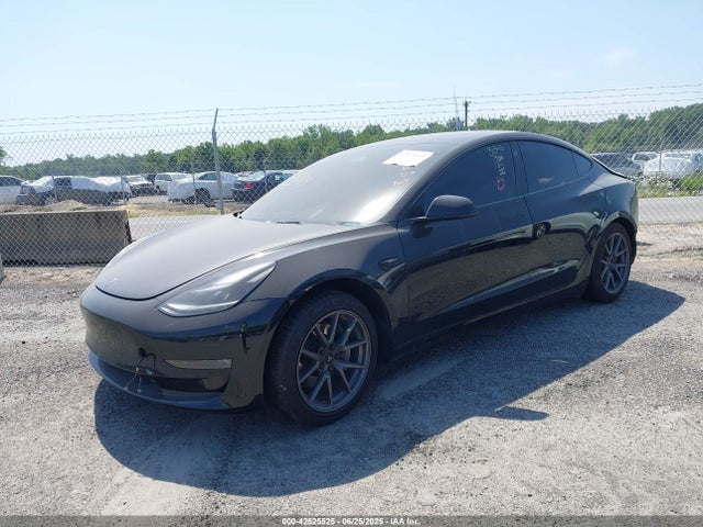5YJ3E1EB3NF106675 Tesla 2022