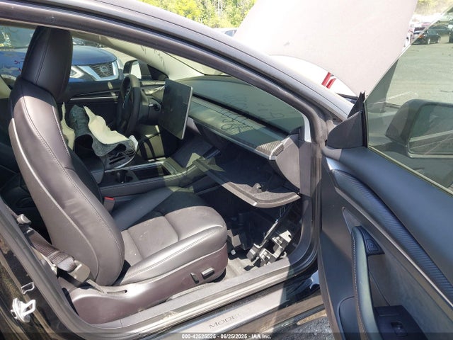 5YJ3E1EB3NF106675 Tesla 2022