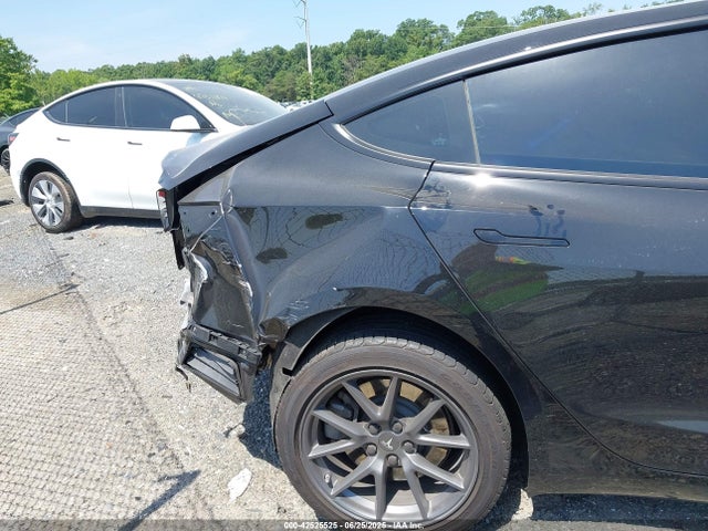5YJ3E1EB3NF106675 Tesla 2022