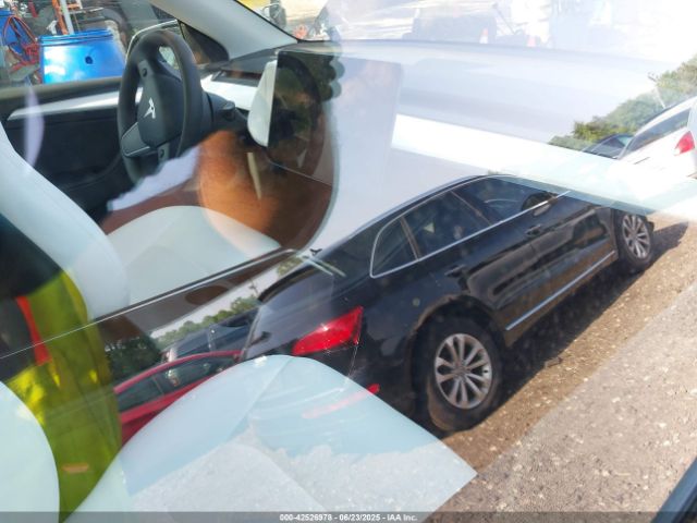 2025 TESLA MODEL Y 7SAYGDEF9SF305944 Photo 4