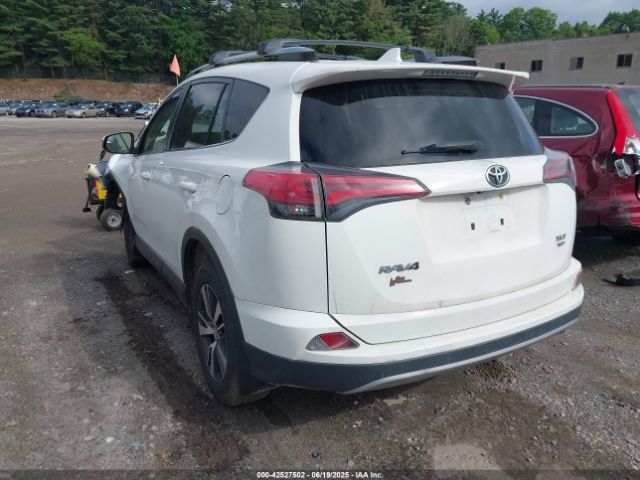 2017 TOYOTA RAV4 JTMRFREV7HD199244 Photo 2
