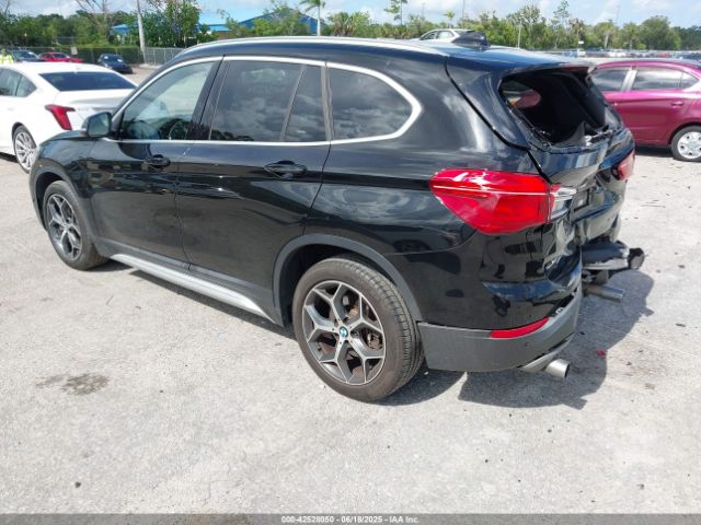 2019 BMW X1 WBXHU7C52K5L11851 Photo 2
