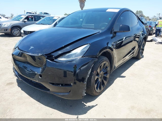 2023 TESLA MODEL Y 7SAYGAEE2PF638323 Photo 1