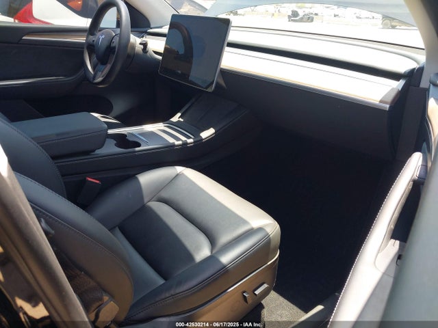 2023 TESLA MODEL Y 7SAYGAEE2PF638323 Photo 4