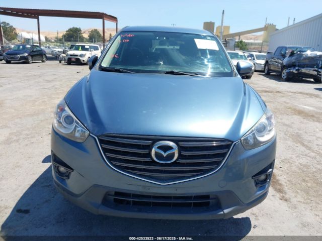 JM3KE2CYXG0838223 Mazda py