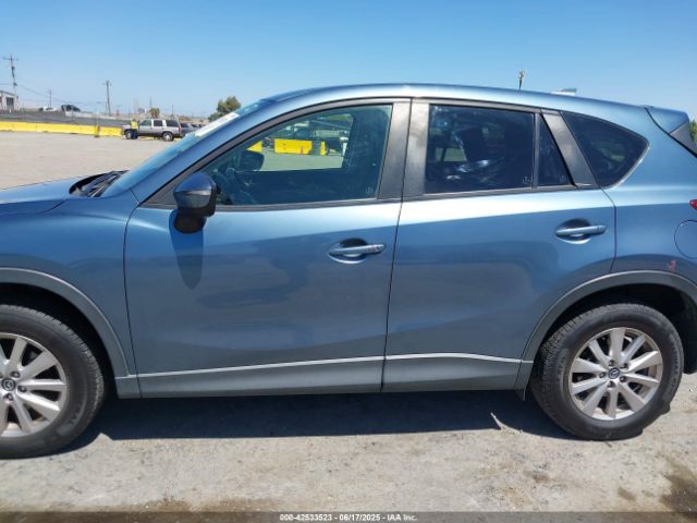 JM3KE2CYXG0838223 Mazda py