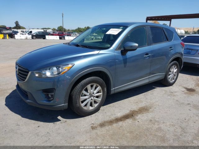 JM3KE2CYXG0838223 Mazda py