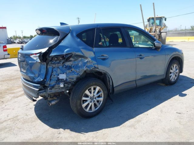 JM3KE2CYXG0838223 Mazda py