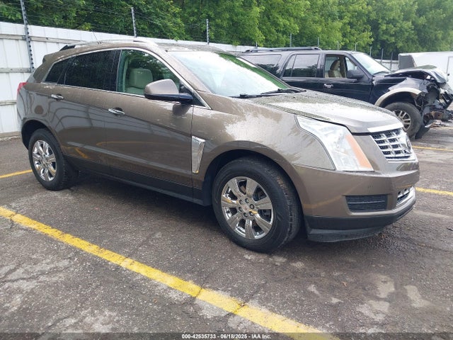 2014 CADILLAC SRX 3GYFNEE39ES642030 Photo 0