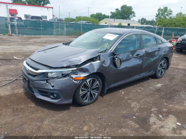 2016 HONDA CIVIC 2HGFC1F34GH632998 Photo 1