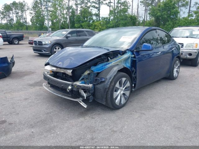 2021 TESLA MODEL Y 5YJYGAEEXMF148513 Photo 1