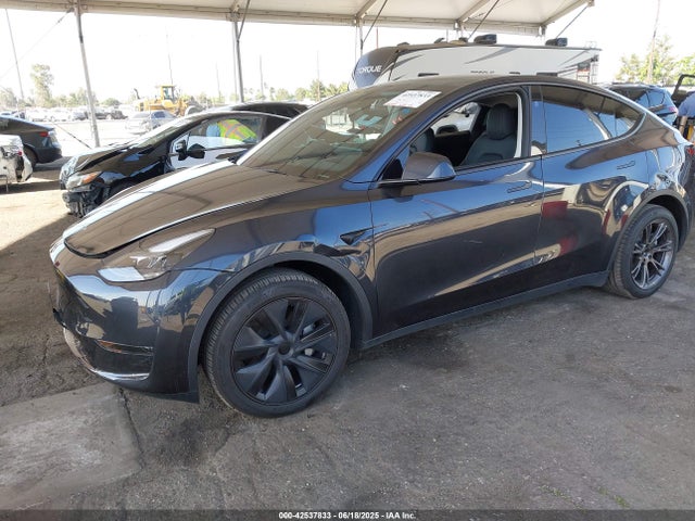 2024 TESLA MODEL Y 7SAYGDED9RF199553 Photo 1