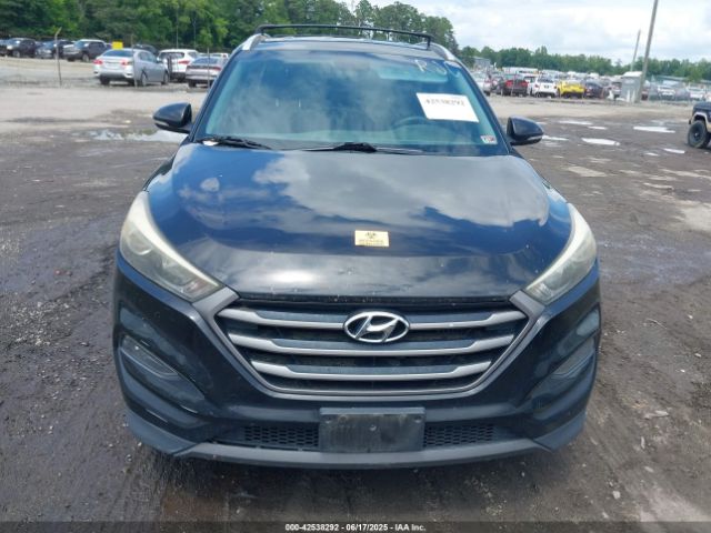 KM8J3CA27GU060868 Hyundai Tucson