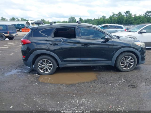 KM8J3CA27GU060868 Hyundai Tucson