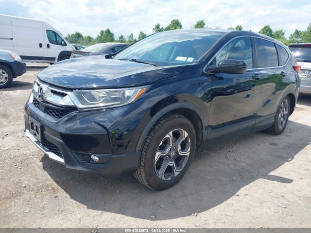2018 HONDA CR-V 7FARW2H81JE003380 Photo 1