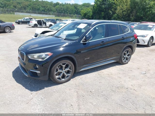 2016 BMW X1 WBXHT3C39G5F65920 Photo 1