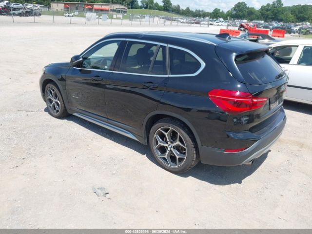 2016 BMW X1 WBXHT3C39G5F65920 Photo 2