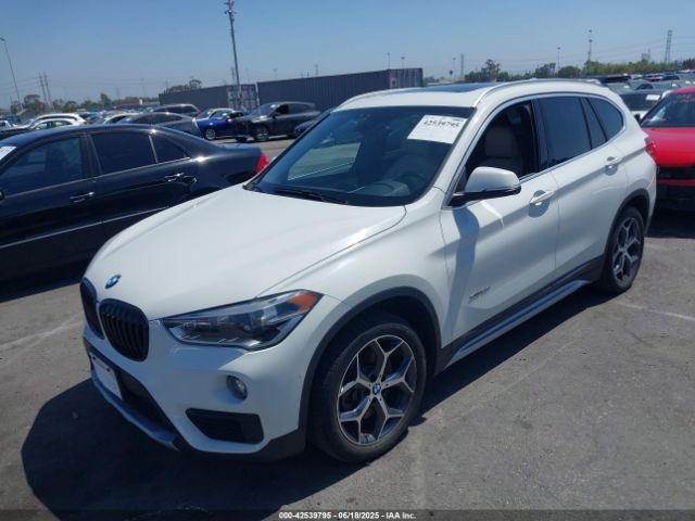 2017 BMW X1 WBXHT3C30H5F75950 Photo 1