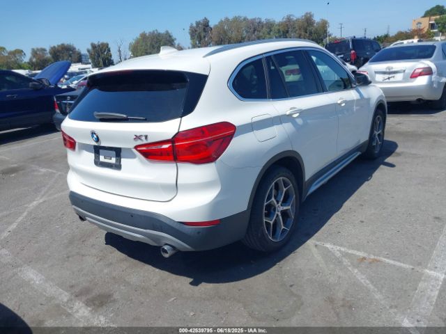 2017 BMW X1 WBXHT3C30H5F75950 Photo 3