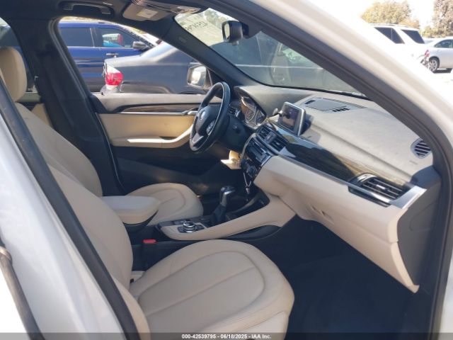 2017 BMW X1 WBXHT3C30H5F75950 Photo 4
