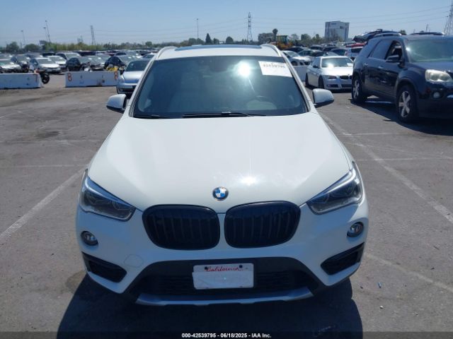 2017 BMW X1 WBXHT3C30H5F75950 Photo 5