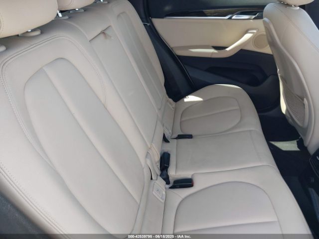 2017 BMW X1 WBXHT3C30H5F75950 Photo 7