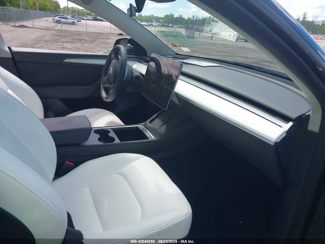 2023 TESLA MODEL Y 7SAYGDEEXPF630116 Photo 4