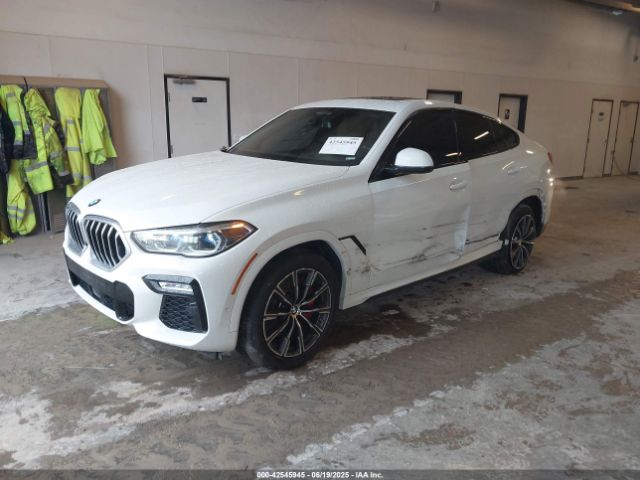 2021 BMW X6 5UXCY6C02M9F21776 Photo 1