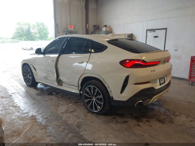 2021 BMW X6 5UXCY6C02M9F21776 Photo 2