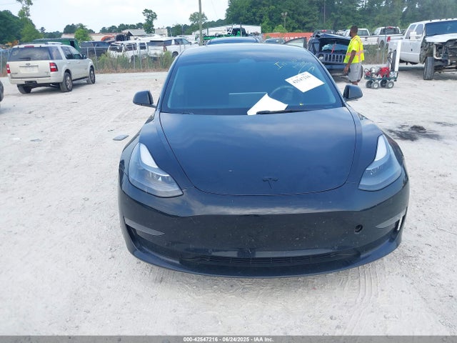 5YJ3E1EB1NF190415 Tesla 2022