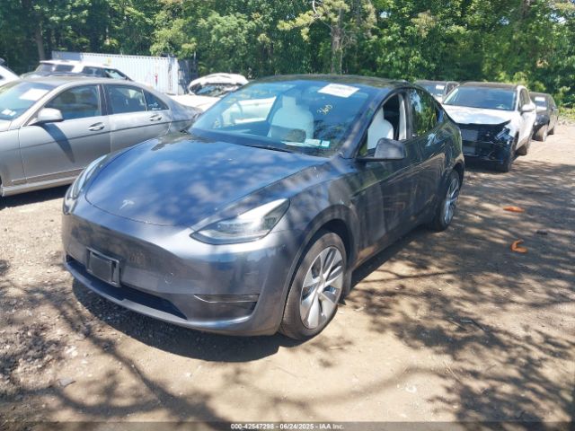 2023 TESLA MODEL Y 7SAYGAEE9PF916988 Photo 1