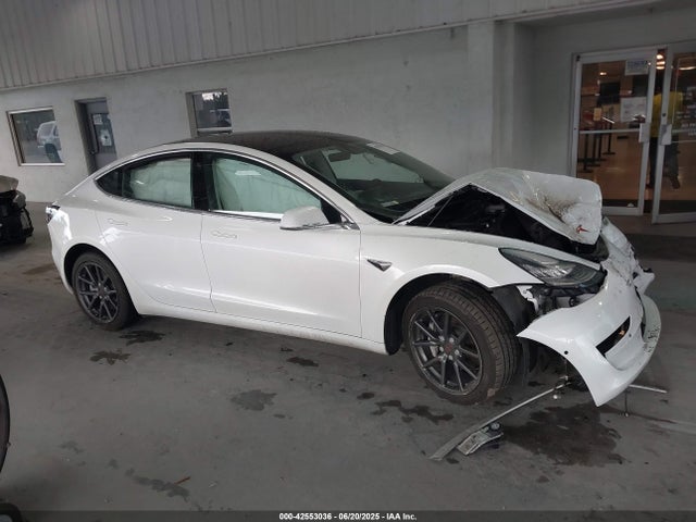 5YJ3E1EB2JF100120 Tesla 2018