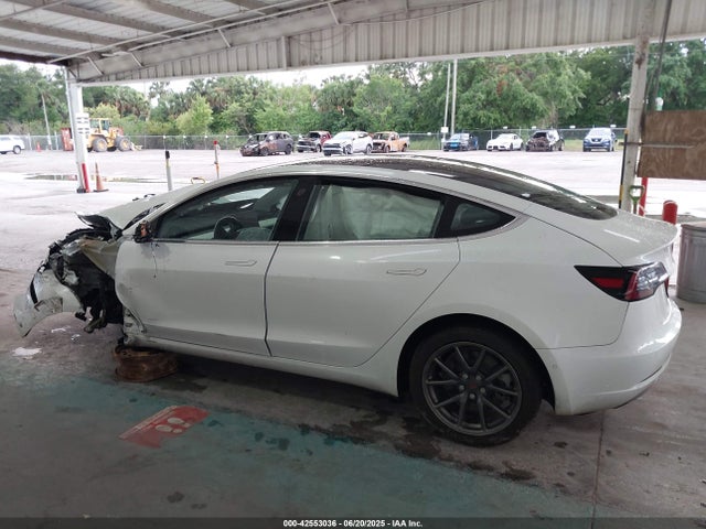 5YJ3E1EB2JF100120 Tesla 2018
