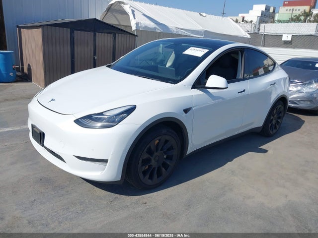 2021 TESLA MODEL Y 5YJYGAEE4MF265696 Photo 1