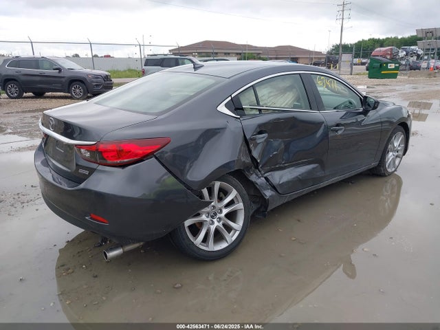 JM1GJ1V53G1432768 Mazda py
