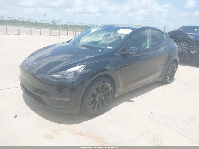 2024 TESLA MODEL Y 7SAYGAEE1RF168188 Photo 1