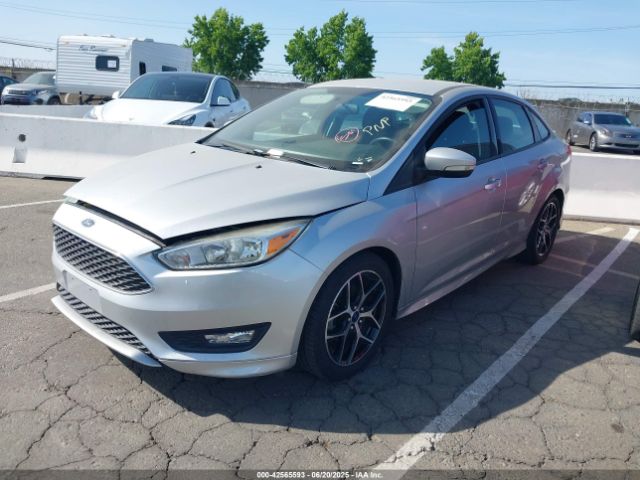 2015 FORD FOCUS 1FADP3FE7FL348733 Photo 1