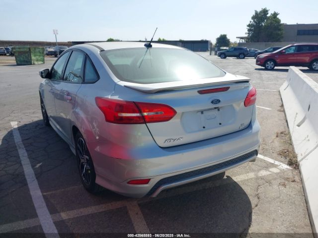 2015 FORD FOCUS 1FADP3FE7FL348733 Photo 2