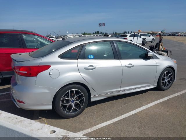 2015 FORD FOCUS 1FADP3FE7FL348733 Photo 3