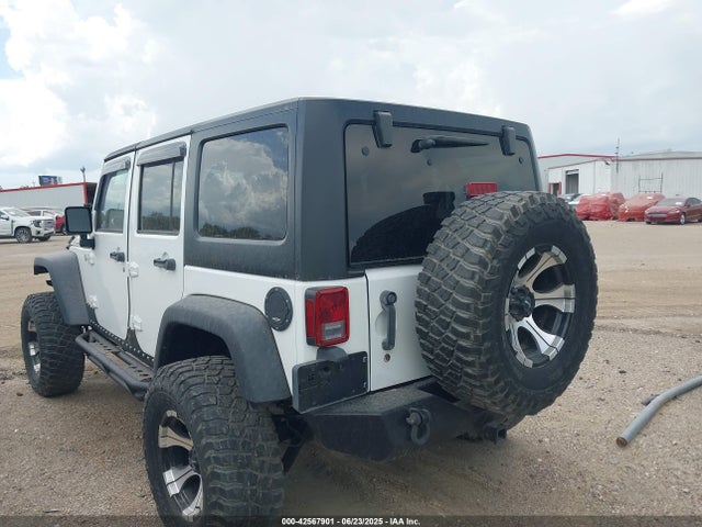 2011 Jeep Wrangler Unlimited Rubicon მანქანა იყიდება აუქციონზე, vin: 1J4BA6H10BL536027, აუქციონის ნომერი: 42567901
