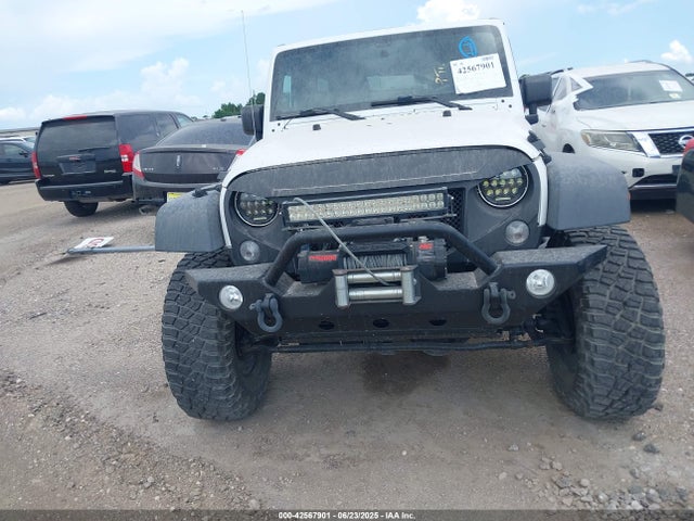 2011 Jeep Wrangler Unlimited Rubicon მანქანა იყიდება აუქციონზე, vin: 1J4BA6H10BL536027, აუქციონის ნომერი: 42567901