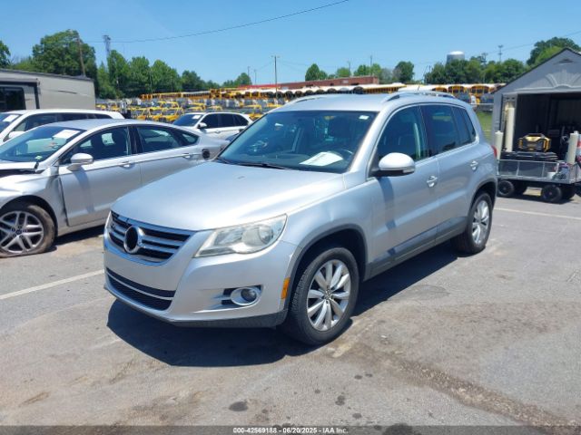 2011 VOLKSWAGEN TIGUAN WVGAV7AXXBW511253 Photo 1