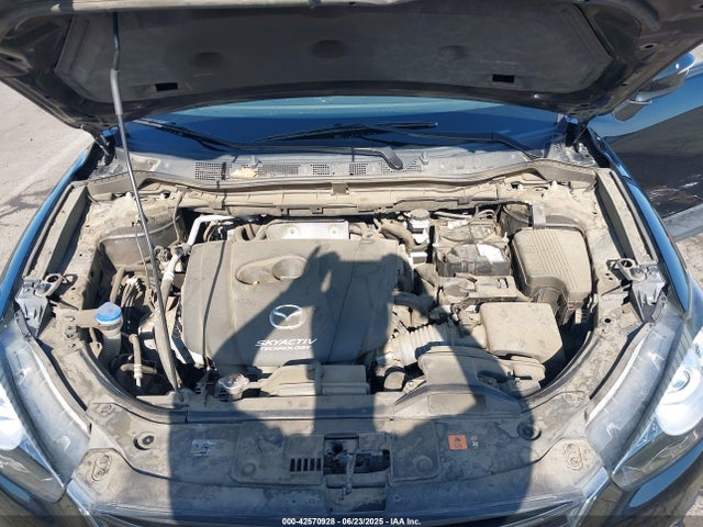 JM3KE2CY6G0911717 Mazda py